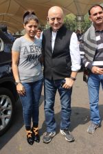 Sunidhi Chauhan, Anupam Kher snapped at airport on 9th Feb 2016